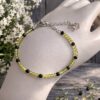 BRACELET PIERRES NATURELLES PERIDOT ET SPINELLES NOIRE FACETTEES